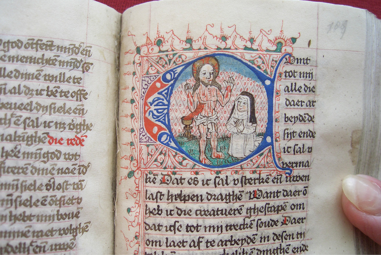 Fig. 128  Folio in a prayerbook, with an initial depicting Christ opening his side wound in the presence of an Augustinian sister. Heverlee, Abdij van Park, Ms. 18, fol. 109r.