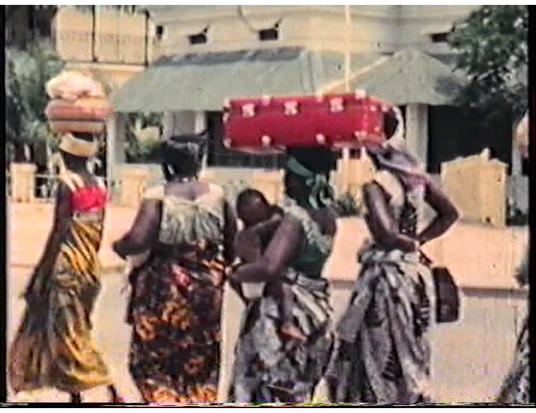 women in the Congo, 1960-61, wearing traditional outfits; snapshots taken from a home film