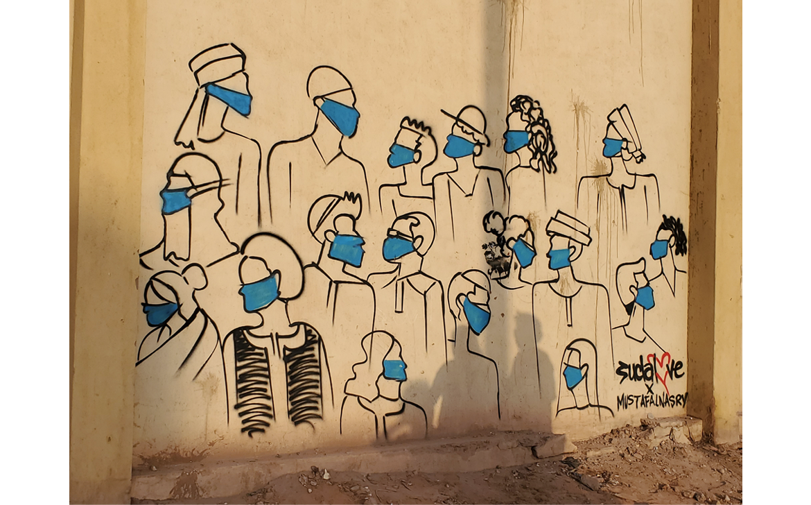 Painted in spray paint on a wall, a crowd of individuals, all wearing different styles of head coverings and clothing, is created through simple black outlines. The figures are packed closely together and they are all shown in profile, as if they are engaging with each other.