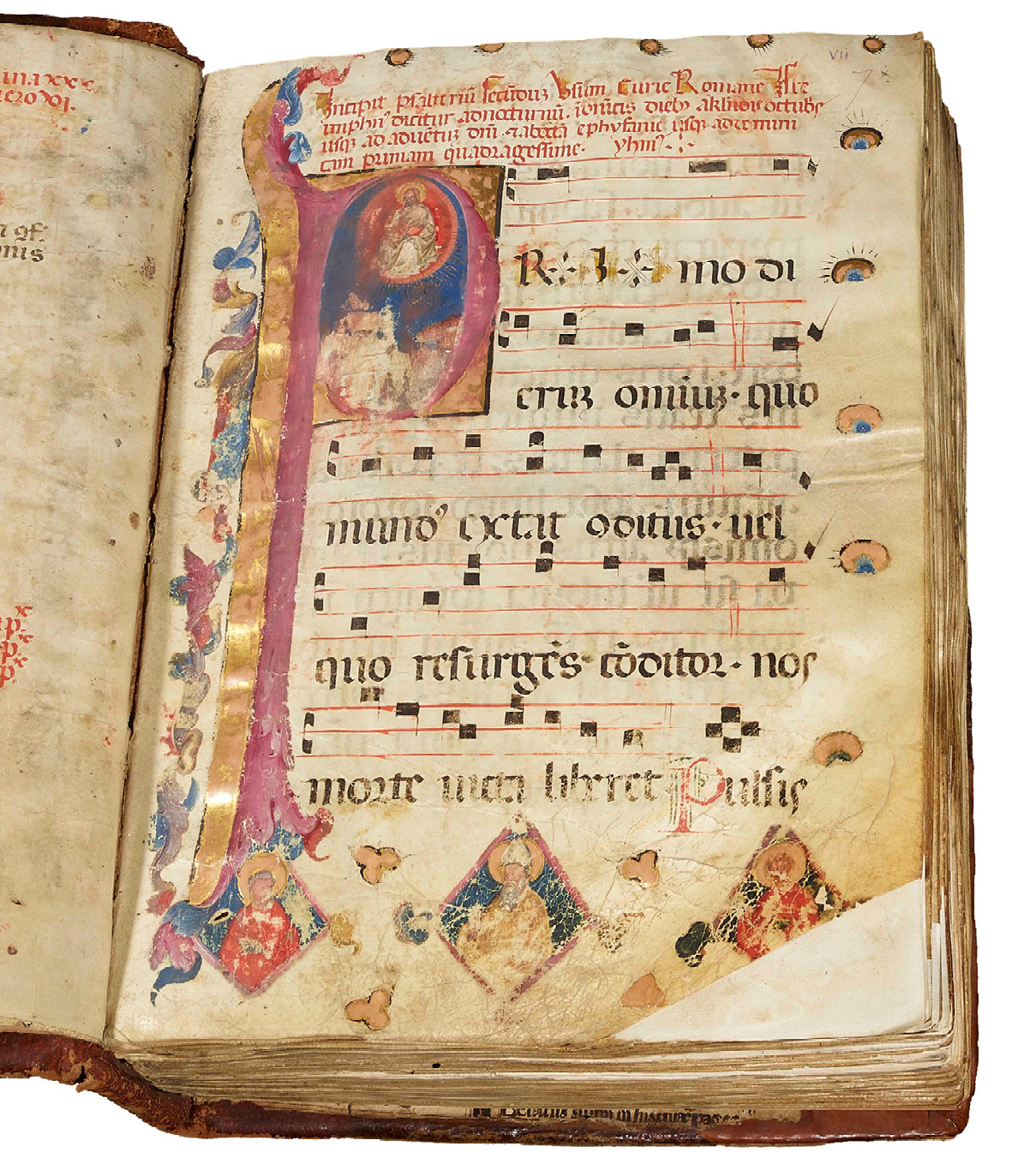Folio in a noted ferial choir Psalter, possibly for St Lawrence’s, Trau (Dalmatia), made around 1450-1475. It is a large manuscript with 5 huge lines of musical staffs and text in Latin, with a very large illuminated initial at the upper left corner. This initial bears an image of God the Father and has been touched and abraded.