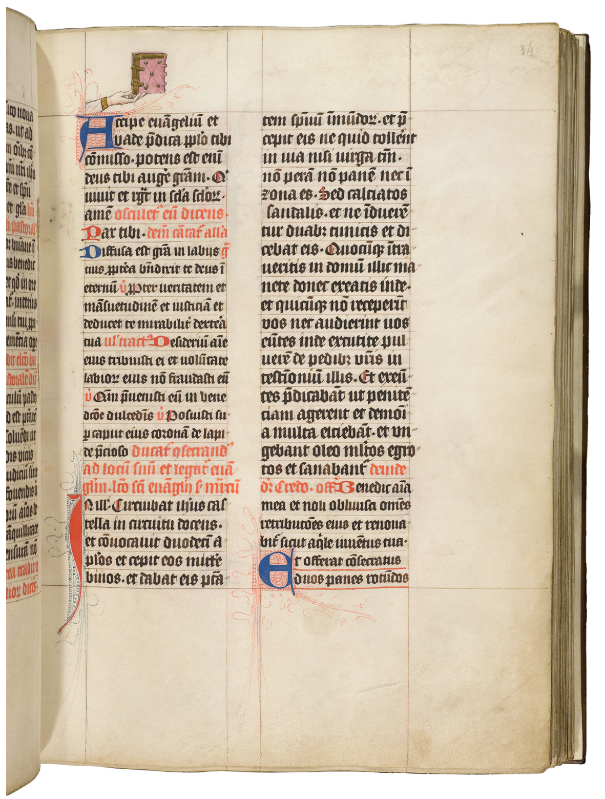 Folio from a Pontifical made around 1450. Extending into the upper margin is an image of the hand of God holding book into the margin.