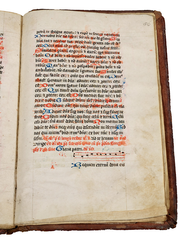 Right half of an opening, with a rubricated noted ritual made in England in the fifteenth century. It contains instructions for performing last rites. Holy water that has splashed on the book has caused the red ink to run.