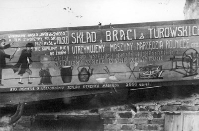 The sign atop an antisemitic store in Mlawa, northeastern Poland.