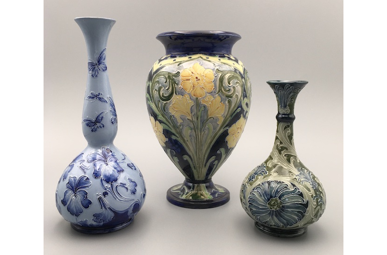 Vase with violets encircling the belly and butterflies in flight around the neck; urn whose contours are echoed by decorated panels of Narcissi; vase with daisy flower on its rounded body and cornflowers climbing a slender neck. ,,,