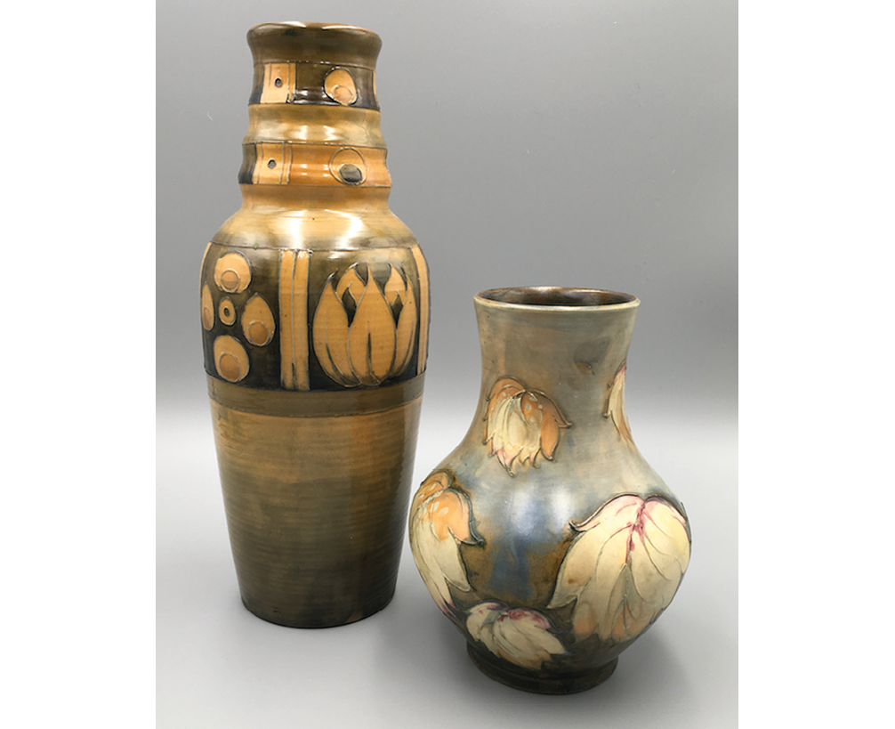 Two vases with simplified decorative motifs: a tall, dark ochre vase decorated with stylized peacock eyes and tulips; a swollen vase with matt glaze, depicting isolated leaves with pink highlights.",,,