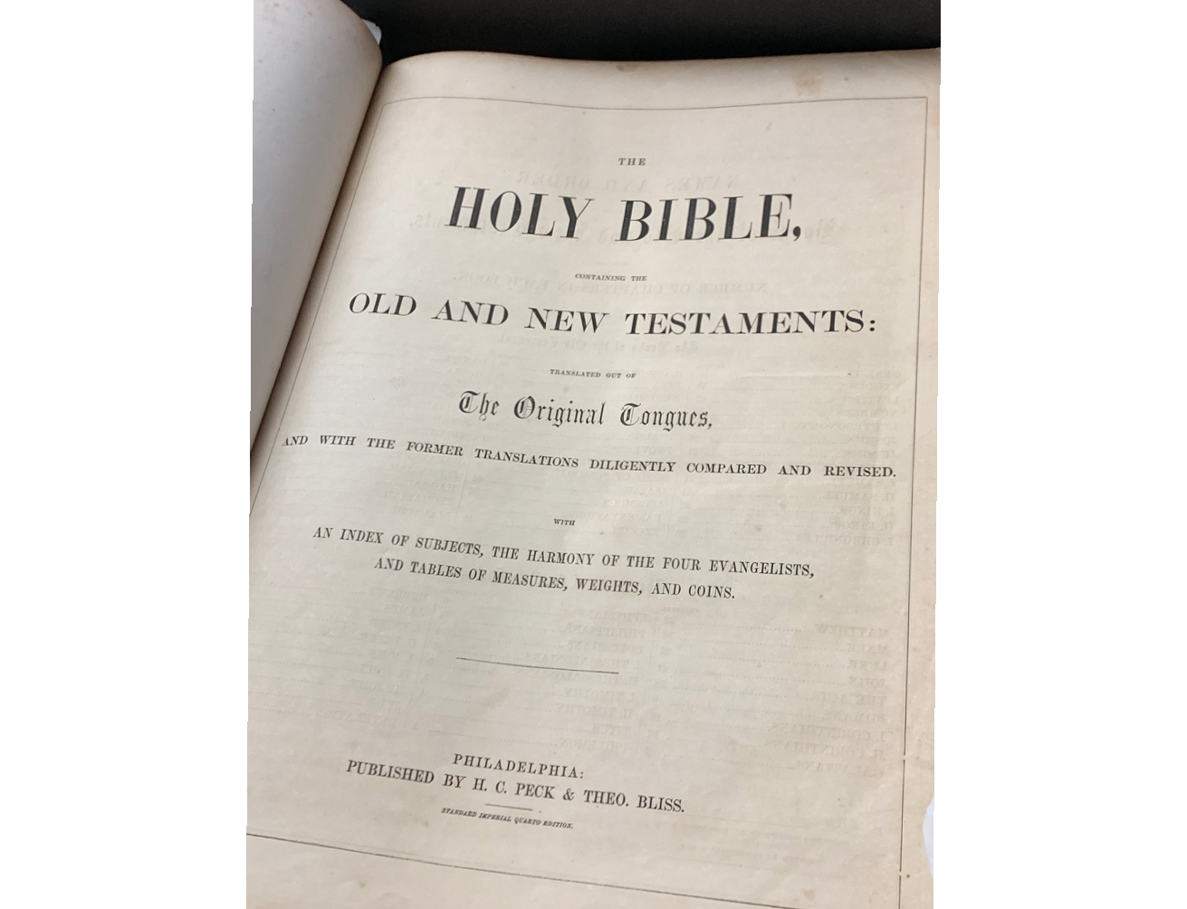 Title page of H.C. Peck and Theo Bliss Holy Bible, black and white, plain and austere in style.