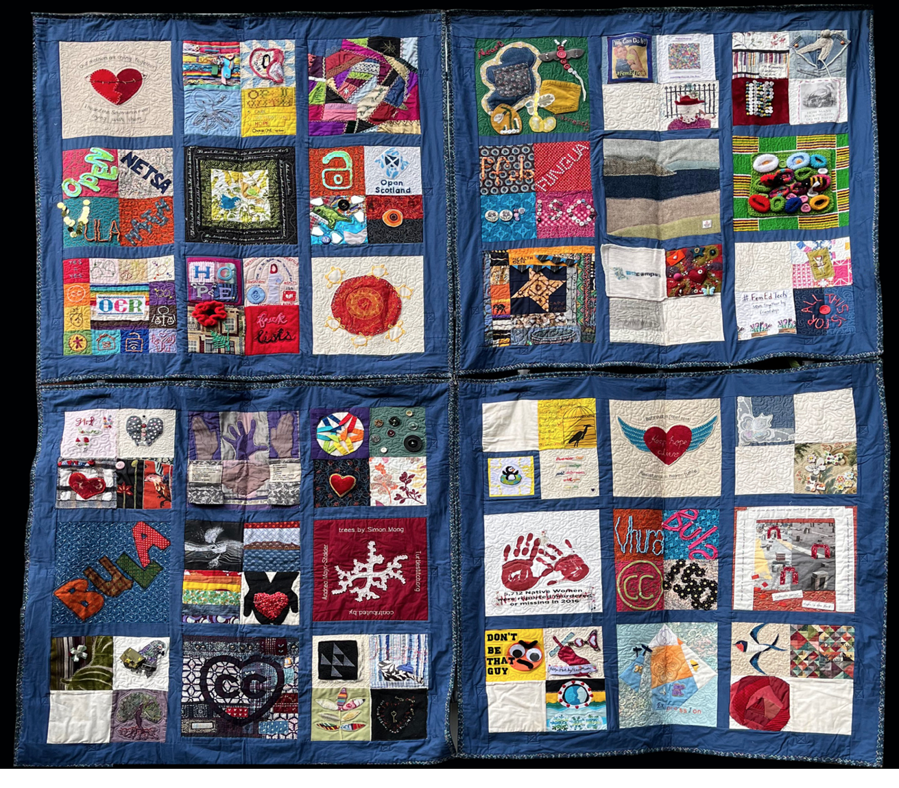 Quilt made of four hemmed pieces of blue fabric sewn together in two layers, one above the other. Each piece has nine fabric squares stitched to it presenting various images.