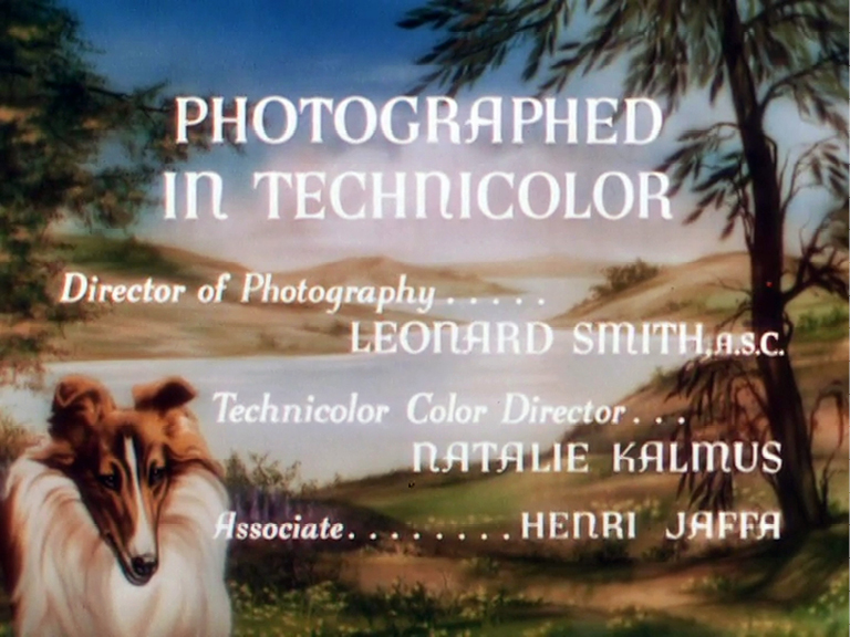 End credits of the film ‘Lassie Come Home’ showing Technicolor photography credits. The names include Leonard Smith as the director of photography and Natalie Kalmus as the Technicolor color director. The backdrop features a picturesque landscape with Lassie, the famous collie dog.”,