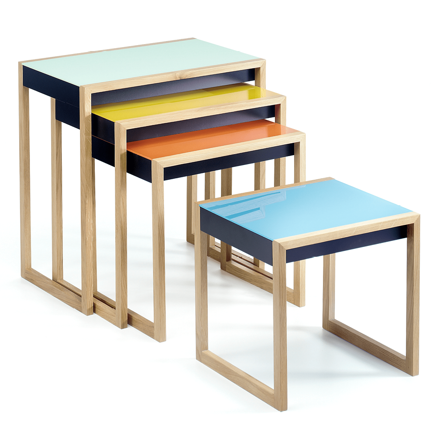 An image of the Bauhaus-inspired Josef Albers’ nesting tables. The set of four tables showcases modernist design with clean lines, oak frames, and tops painted in pastel colors like blue, orange, yellow, and mint green.”,