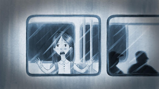 A blueish/sepia illustration from the ‘Ghost Train’ story, which shows a young girl on the train. The girl looks scared and her mouth is open as if she is screaming. The girl’s hands are pressed on the train’s window and she is looking outside. In the background, there are shadows of two adult passengers sitting calmly on the train.